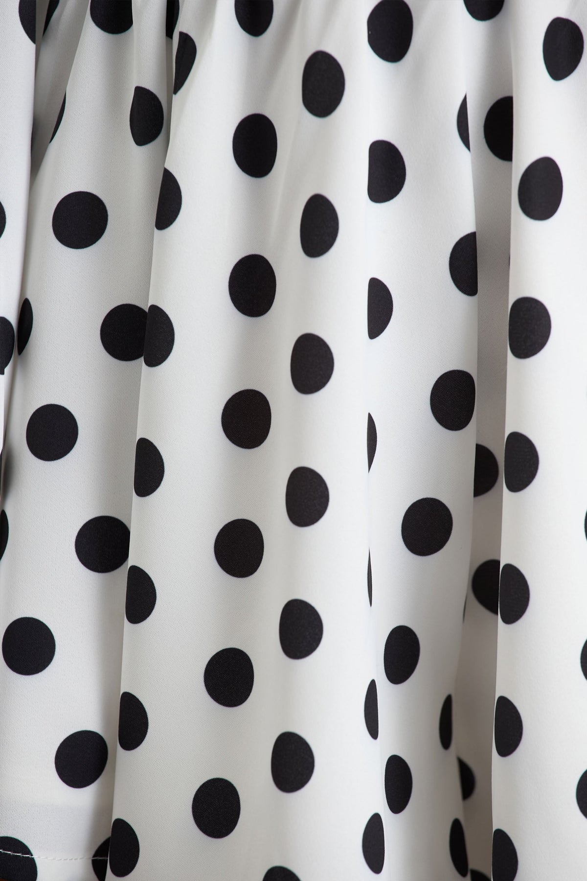 Laurel | White Polka Dot V-Neck Balloon Sleeve Romper